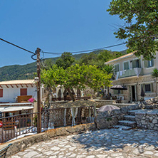 AGIOS NIKITAS, LEFKADA, GREECE - JULY 16, 2014: Traditional houses in village of Agios Nikitas, Lefkada, Ionian Islands, Greece