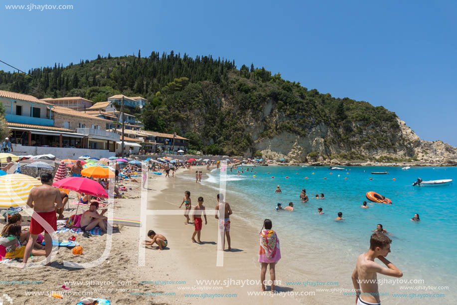 AGIOS NIKITAS, LEFKADA, GREECE - JULY 16, 2014: Tourist visiting beach of village of Agios Nikitas, Lefkada, Ionian Islands, Greece