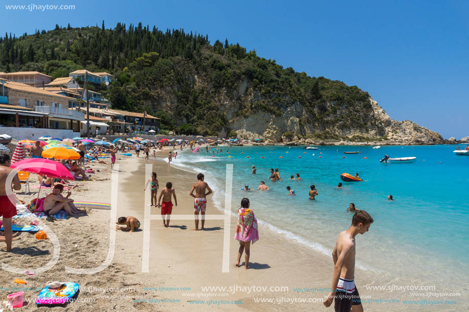 AGIOS NIKITAS, LEFKADA, GREECE - JULY 16, 2014: Tourist visiting beach of village of Agios Nikitas, Lefkada, Ionian Islands, Greece