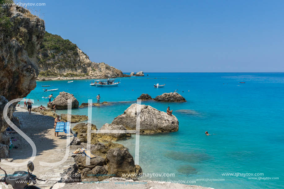 AGIOS NIKITAS, LEFKADA, GREECE - JULY 16, 2014: Tourist visiting beach of village of Agios Nikitas, Lefkada, Ionian Islands, Greece