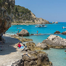 AGIOS NIKITAS, LEFKADA, GREECE - JULY 16, 2014: Tourist visiting beach of village of Agios Nikitas, Lefkada, Ionian Islands, Greece