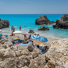 MEGALI PETRA BEACH, LEFKADA, GREECE - JULY 16, 2014: Panoramic view of blue waters of Megali Petra Beach, Lefkada, Ionian Islands, Greece