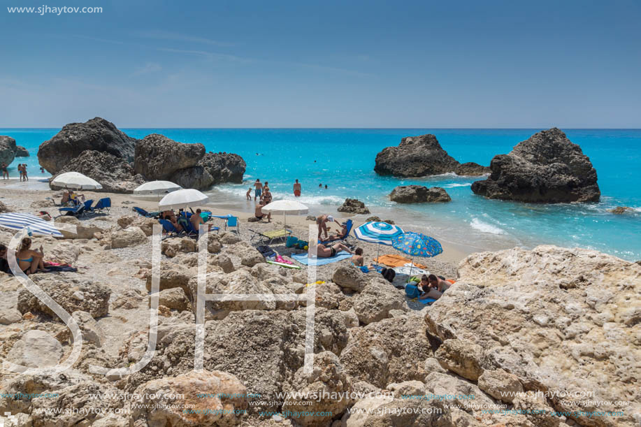 MEGALI PETRA BEACH, LEFKADA, GREECE - JULY 16, 2014: Panoramic view of blue waters of Megali Petra Beach, Lefkada, Ionian Islands, Greece