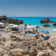 MEGALI PETRA BEACH, LEFKADA, GREECE - JULY 16, 2014: Panoramic view of blue waters of Megali Petra Beach, Lefkada, Ionian Islands, Greece