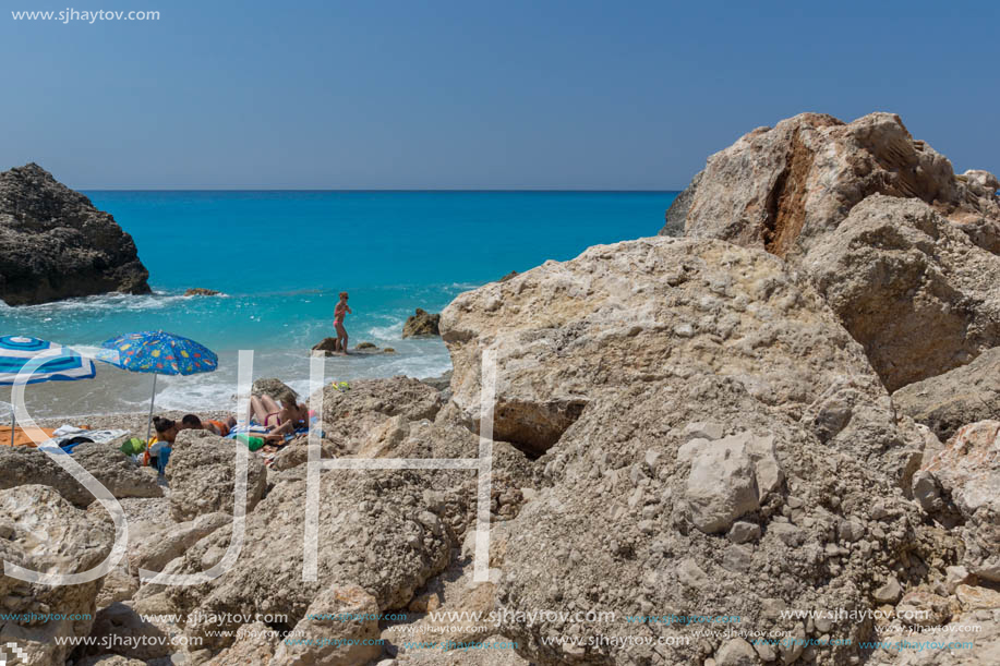 MEGALI PETRA BEACH, LEFKADA, GREECE - JULY 16, 2014: Panoramic view of blue waters of Megali Petra Beach, Lefkada, Ionian Islands, Greece