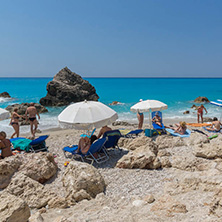 MEGALI PETRA BEACH, LEFKADA, GREECE - JULY 16, 2014: Panoramic view of blue waters of Megali Petra Beach, Lefkada, Ionian Islands, Greece