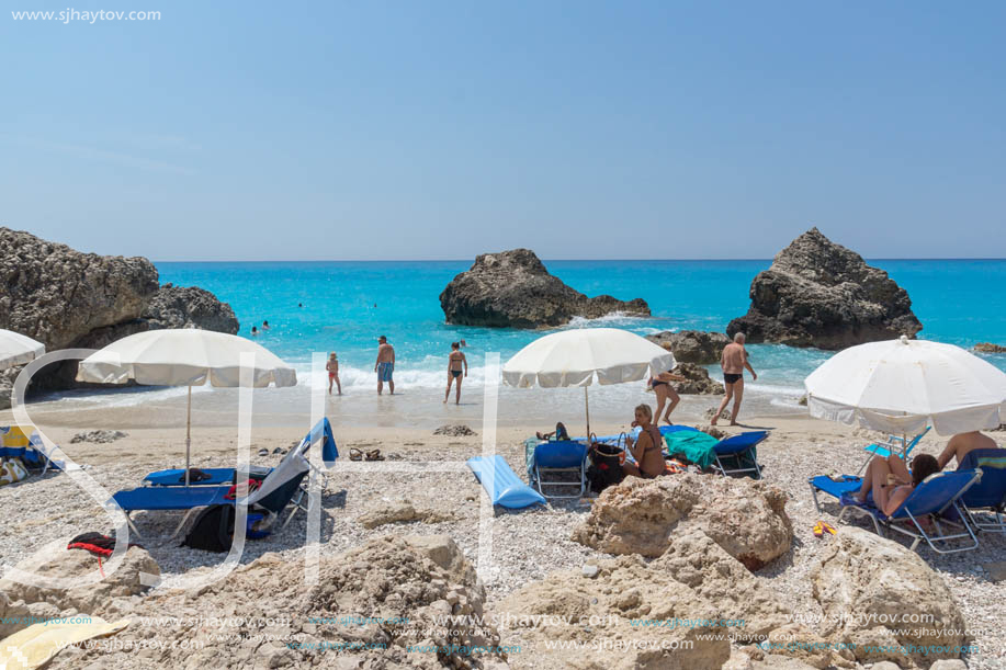 MEGALI PETRA BEACH, LEFKADA, GREECE - JULY 16, 2014: Panoramic view of blue waters of Megali Petra Beach, Lefkada, Ionian Islands, Greece