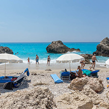 MEGALI PETRA BEACH, LEFKADA, GREECE - JULY 16, 2014: Panoramic view of blue waters of Megali Petra Beach, Lefkada, Ionian Islands, Greece