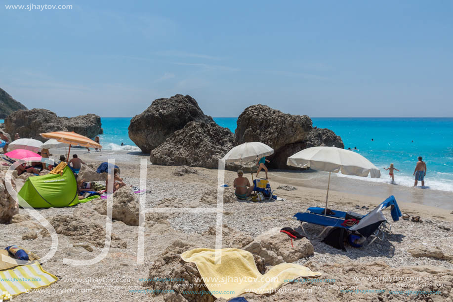 MEGALI PETRA BEACH, LEFKADA, GREECE - JULY 16, 2014: Panoramic view of blue waters of Megali Petra Beach, Lefkada, Ionian Islands, Greece