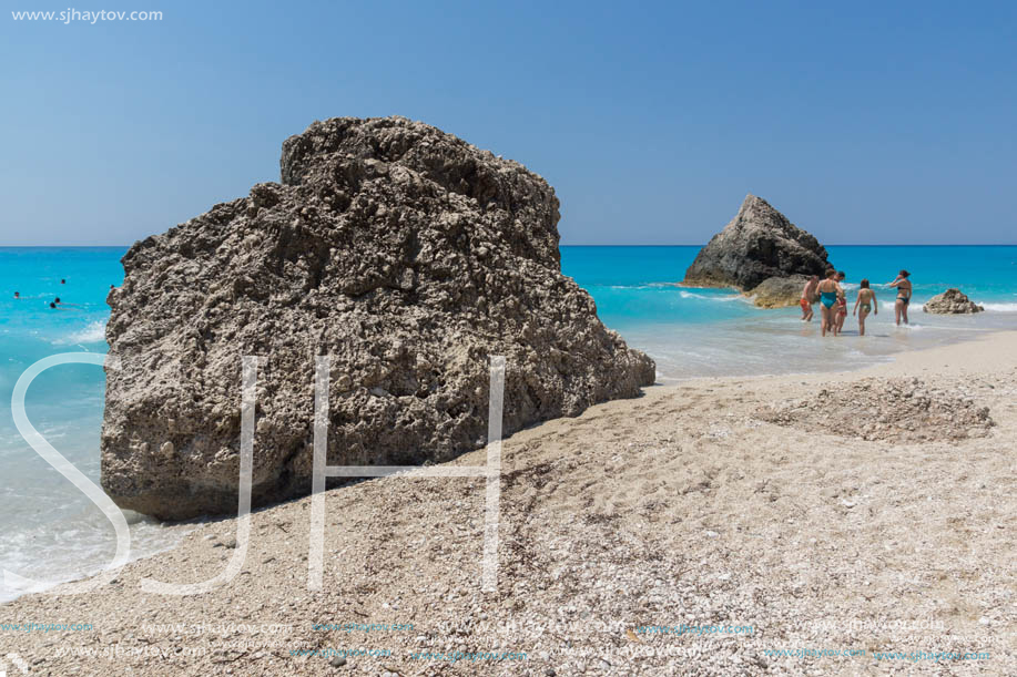 MEGALI PETRA BEACH, LEFKADA, GREECE - JULY 16, 2014: Panoramic view of blue waters of Megali Petra Beach, Lefkada, Ionian Islands, Greece