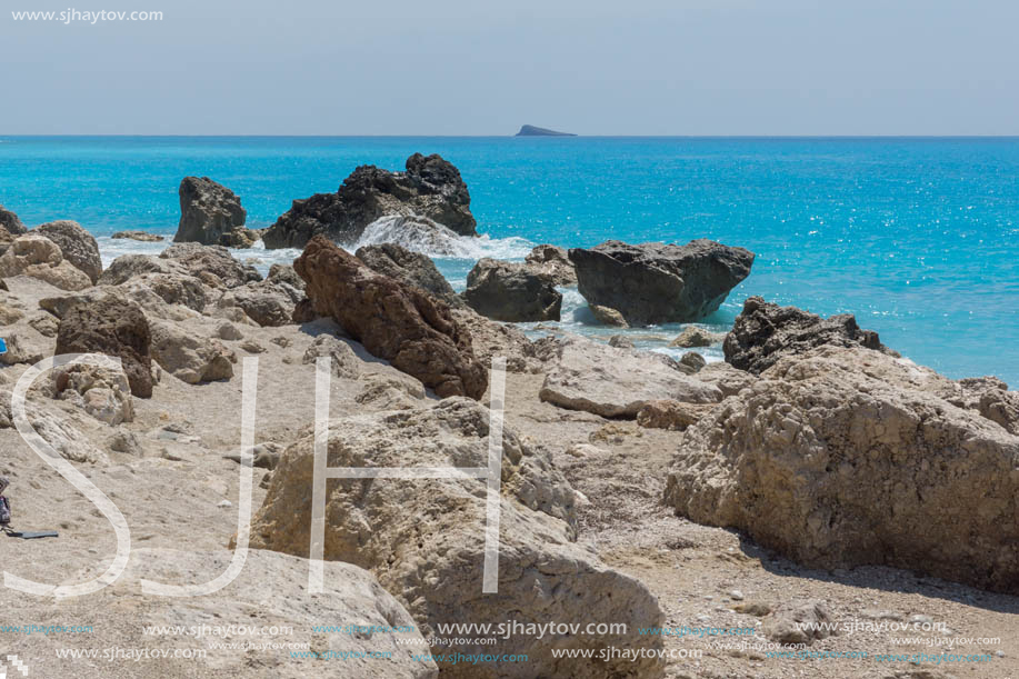 MEGALI PETRA BEACH, LEFKADA, GREECE - JULY 16, 2014: Panoramic view of blue waters of Megali Petra Beach, Lefkada, Ionian Islands, Greece