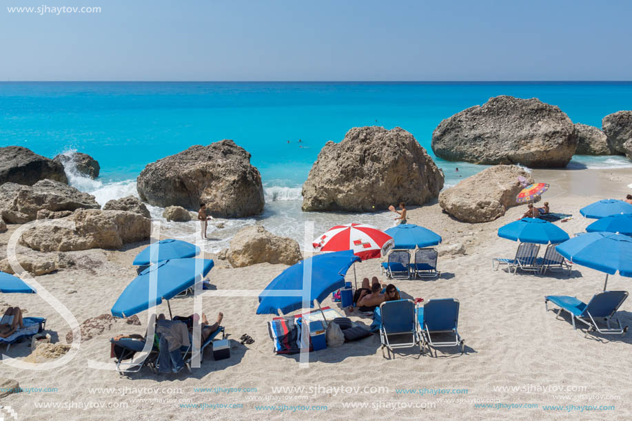 MEGALI PETRA BEACH, LEFKADA, GREECE - JULY 16, 2014: Panoramic view of blue waters of Megali Petra Beach, Lefkada, Ionian Islands, Greece