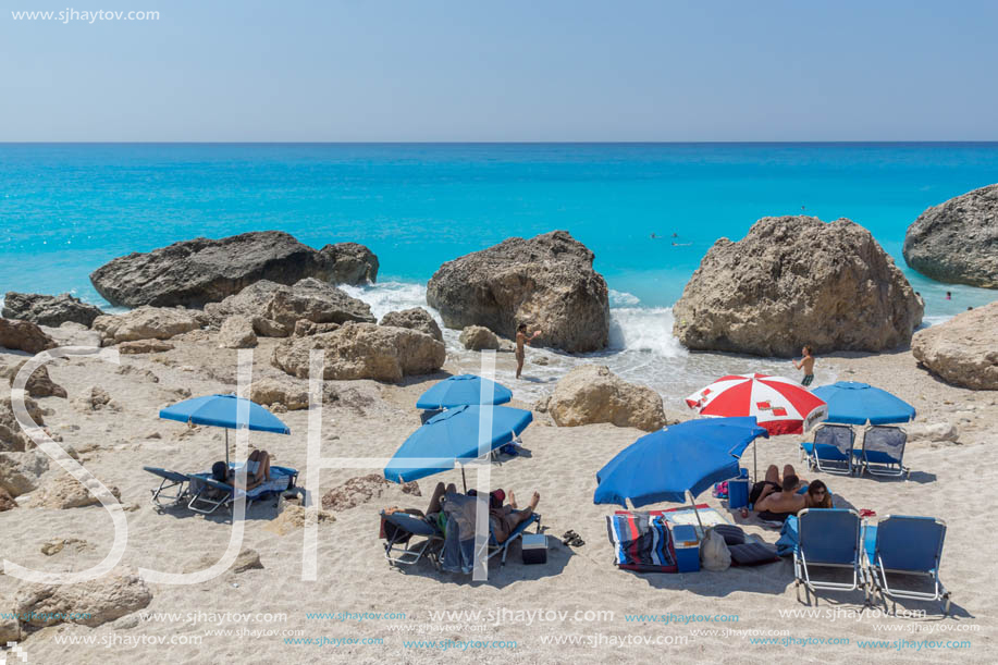 MEGALI PETRA BEACH, LEFKADA, GREECE - JULY 16, 2014: Panoramic view of blue waters of Megali Petra Beach, Lefkada, Ionian Islands, Greece