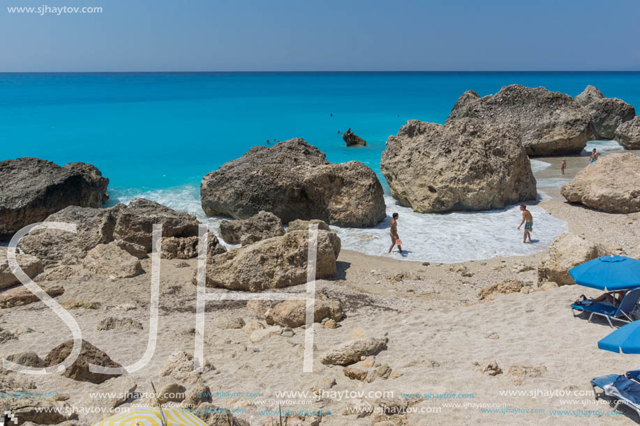 MEGALI PETRA BEACH, LEFKADA, GREECE - JULY 16, 2014: Panoramic view of blue waters of Megali Petra Beach, Lefkada, Ionian Islands, Greece