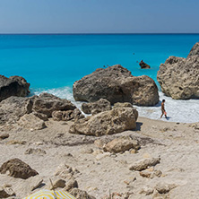 MEGALI PETRA BEACH, LEFKADA, GREECE - JULY 16, 2014: Panoramic view of blue waters of Megali Petra Beach, Lefkada, Ionian Islands, Greece