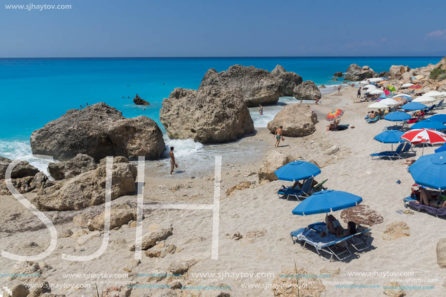 MEGALI PETRA BEACH, LEFKADA, GREECE - JULY 16, 2014: Panoramic view of blue waters of Megali Petra Beach, Lefkada, Ionian Islands, Greece