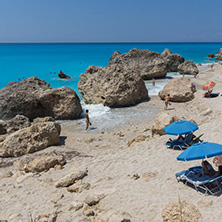 MEGALI PETRA BEACH, LEFKADA, GREECE - JULY 16, 2014: Panoramic view of blue waters of Megali Petra Beach, Lefkada, Ionian Islands, Greece