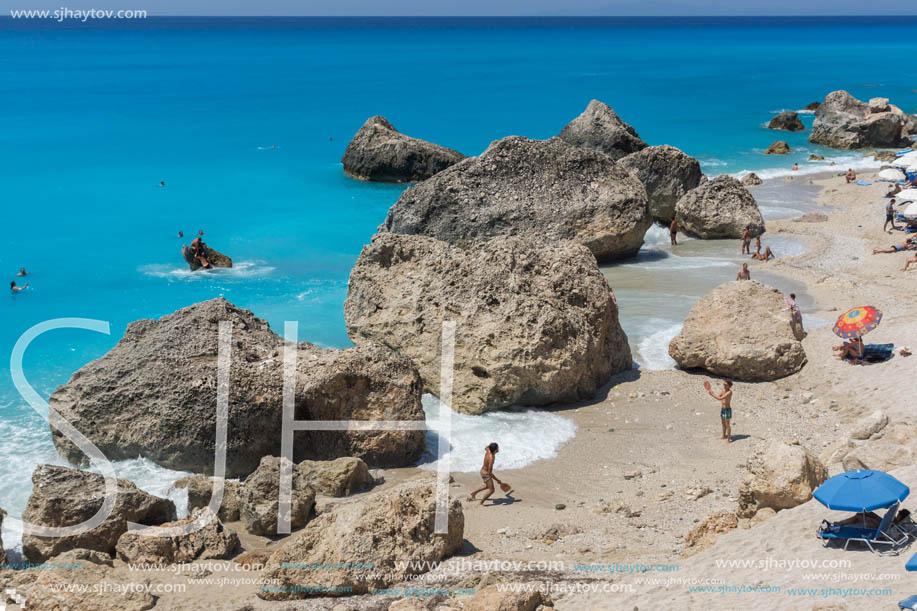 MEGALI PETRA BEACH, LEFKADA, GREECE - JULY 16, 2014: Panoramic view of blue waters of Megali Petra Beach, Lefkada, Ionian Islands, Greece