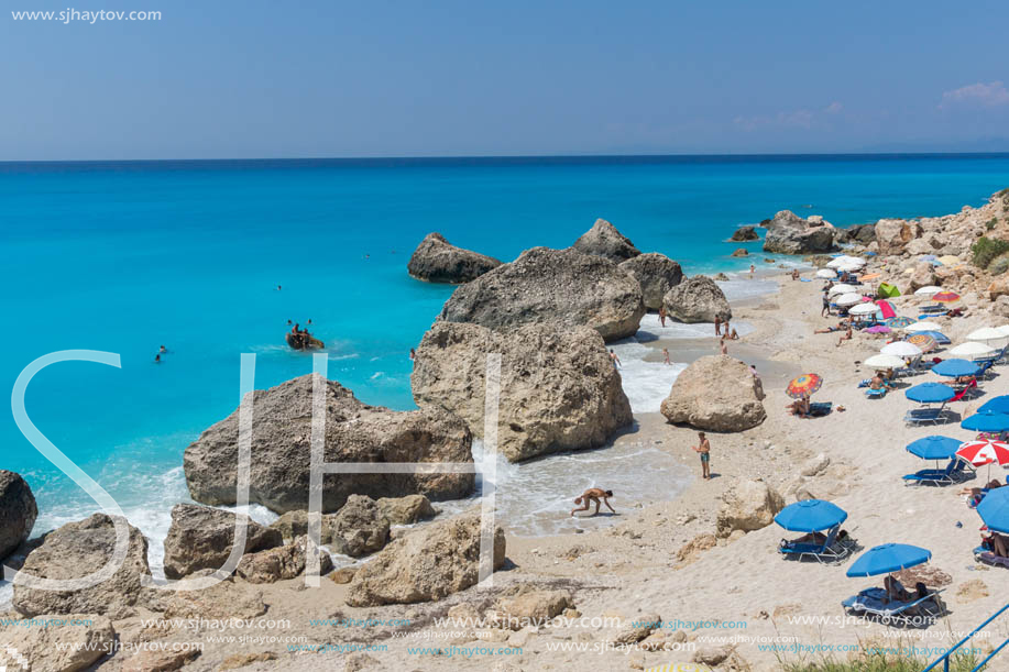 MEGALI PETRA BEACH, LEFKADA, GREECE - JULY 16, 2014: Panoramic view of blue waters of Megali Petra Beach, Lefkada, Ionian Islands, Greece