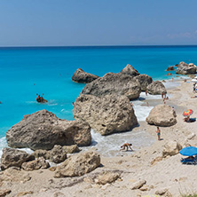 MEGALI PETRA BEACH, LEFKADA, GREECE - JULY 16, 2014: Panoramic view of blue waters of Megali Petra Beach, Lefkada, Ionian Islands, Greece