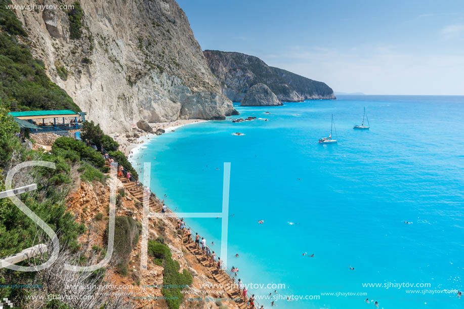 PORTO KATSIKI BEACH, LEFKADA, GREECE - JULY 16, 2014: People visiting Porto Katsiki Beach with blue waters, Lefkada, Ionian Islands, Greece