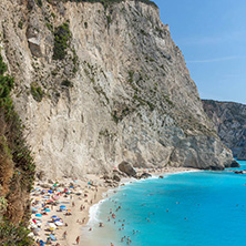 PORTO KATSIKI BEACH, LEFKADA, GREECE - JULY 16, 2014: People visiting Porto Katsiki Beach with blue waters, Lefkada, Ionian Islands, Greece