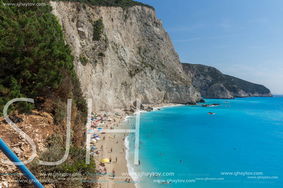 PORTO KATSIKI BEACH, LEFKADA, GREECE - JULY 16, 2014: People visiting Porto Katsiki Beach with blue waters, Lefkada, Ionian Islands, Greece