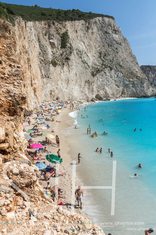 PORTO KATSIKI BEACH, LEFKADA, GREECE - JULY 16, 2014: People visiting Porto Katsiki Beach with blue waters, Lefkada, Ionian Islands, Greece