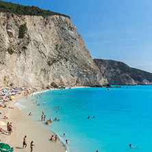 PORTO KATSIKI BEACH, LEFKADA, GREECE - JULY 16, 2014: People visiting Porto Katsiki Beach with blue waters, Lefkada, Ionian Islands, Greece