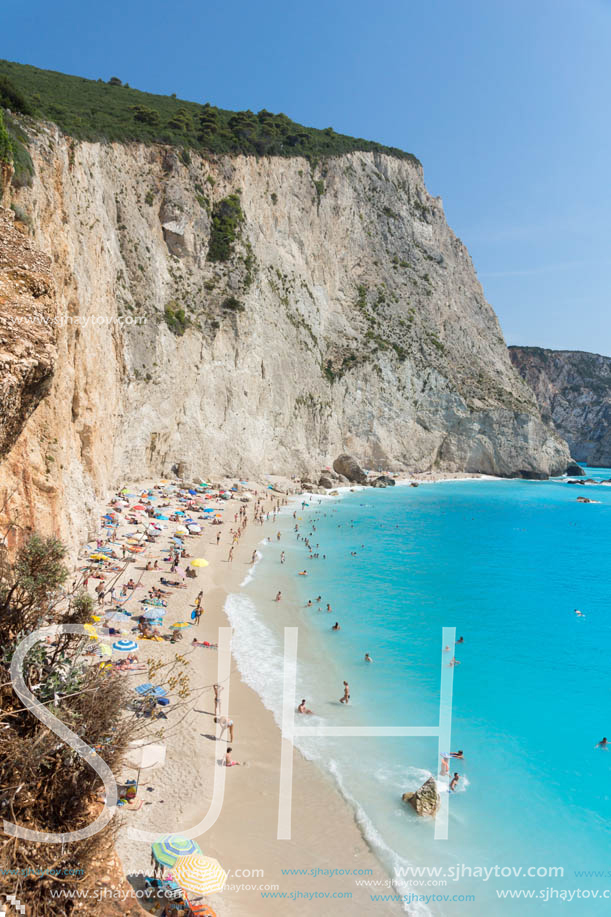 PORTO KATSIKI BEACH, LEFKADA, GREECE - JULY 16, 2014: People visiting Porto Katsiki Beach with blue waters, Lefkada, Ionian Islands, Greece