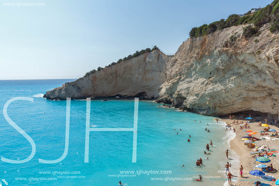 PORTO KATSIKI BEACH, LEFKADA, GREECE - JULY 16, 2014: People visiting Porto Katsiki Beach with blue waters, Lefkada, Ionian Islands, Greece