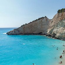 PORTO KATSIKI BEACH, LEFKADA, GREECE - JULY 16, 2014: People visiting Porto Katsiki Beach with blue waters, Lefkada, Ionian Islands, Greece