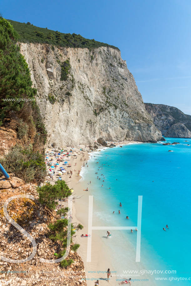 PORTO KATSIKI BEACH, LEFKADA, GREECE - JULY 16, 2014: People visiting Porto Katsiki Beach with blue waters, Lefkada, Ionian Islands, Greece