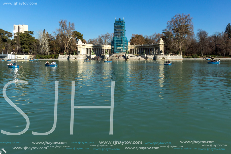 MADRID, SPAIN - JANUARY 22, 2018: Large pond of the Retiro and Monument to Alfonso XII in The Retiro Park in City of Madrid, Spain