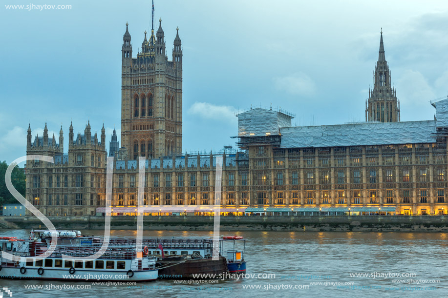 LONDON, ENGLAND - JUNE 16 2016: Night photo of Houses of Parliament and Thames River, London, England, Great Britain