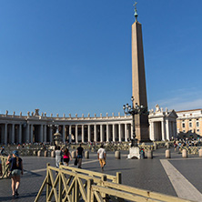 ROME, ITALY - JUNE 24, 2017: Tourists visit Saint Peter"s Square and St. Peter"s Basilica in Rome, Vatican, Italy