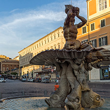 ROME, ITALY - JUNE 24, 2017: Yellow Sunset at Triton Fountain at Piazza Barberini in Rome, Italy