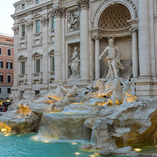 ROME, ITALY - JUNE 24, 2017: Sunset view of Tourist visiting Trevi Fountain (Fontana di Trevi) in city of Rome, Italy