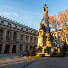 MADRID, SPAIN - JANUARY 22, 2018: Sunset view of Monument of Francisco Romero Robledo and Senate in City of Madrid, Spain