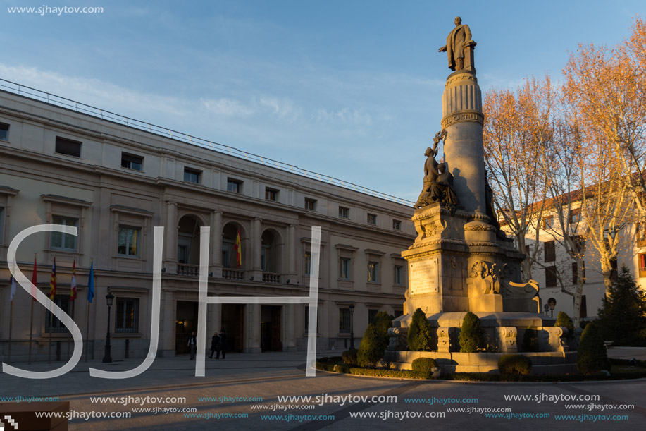 MADRID, SPAIN - JANUARY 22, 2018: Sunset view of Monument of Francisco Romero Robledo and Senate in City of Madrid, Spain