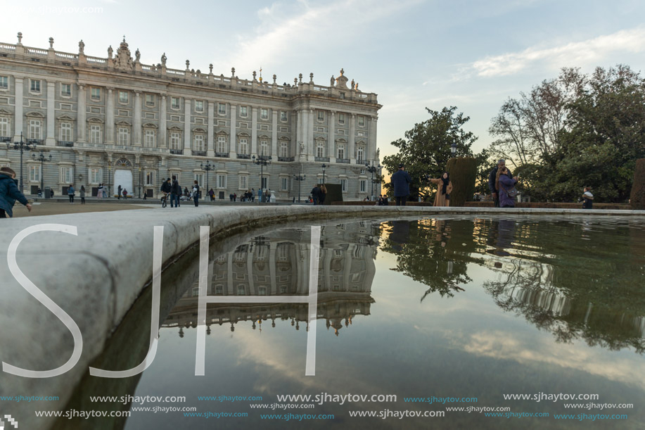 MADRID, SPAIN - JANUARY 22, 2018:  Sunset view of the facade of the Royal Palace of Madrid, Spain