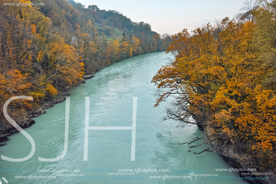 SAINT MAURICE, SWITZERLAND - OCTOBER 27, 2015:  Amazing Autumn Landscape of Rhone River, canton of Vaud, Switzerland