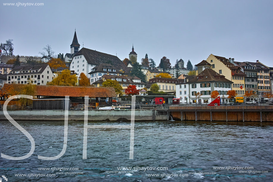 LUCERNE, SWITZERLAND - OCTOBER 28, 2015: The Reuss River  passes through the historic center of City of Luzern, Switzerland