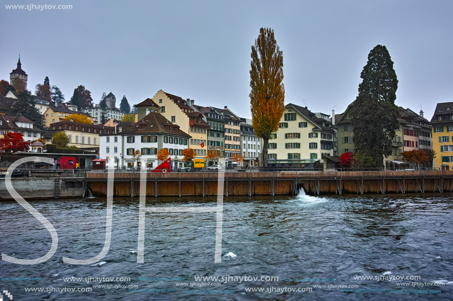 LUCERNE, SWITZERLAND - OCTOBER 28, 2015: The Reuss River River passes through the historic center of City of Luzern, Switzerland