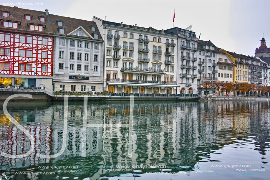 LUCERNE, SWITZERLAND - OCTOBER 28, 2015: The Reuss River River passes through the historic center of City of Luzern, Switzerland