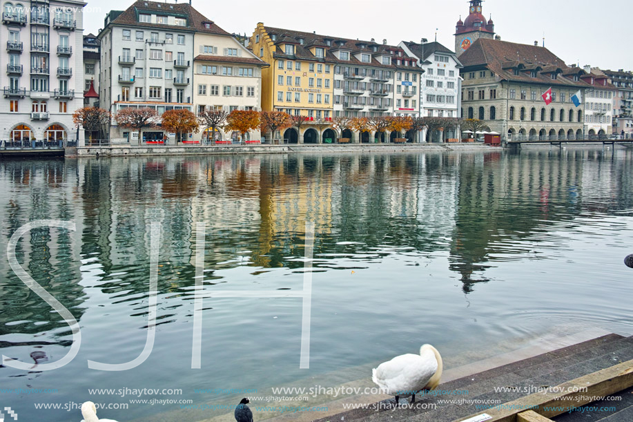 LUCERNE, SWITZERLAND - OCTOBER 28, 2015: The Reuss River River passes through the historic center of City of Luzern, Switzerland