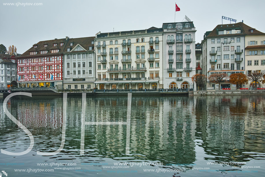 LUCERNE, SWITZERLAND - OCTOBER 28, 2015: The Reuss River River passes through the historic center of City of Luzern, Switzerland