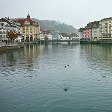 LUCERNE, SWITZERLAND - OCTOBER 28, 2015: The Reuss River River passes through the historic center of City of Luzern, Switzerland