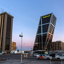 MADRID, SPAIN - JANUARY 23, 2018:  Sunrise view of Gate of Europe (KIO Towers) at Paseo de la Castellana street in City of Madrid, Spain