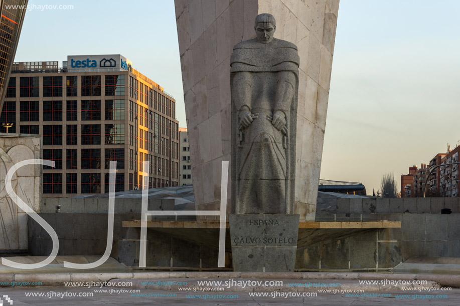 MADRID, SPAIN - JANUARY 23, 2018:  Sunrise view of Gate of Europe (KIO Towers) and Monument to Jose Calvo Sotelo at Paseo de la Castellana street in City of Madrid, Spain